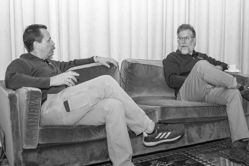 Jay and Jim talking on a couch